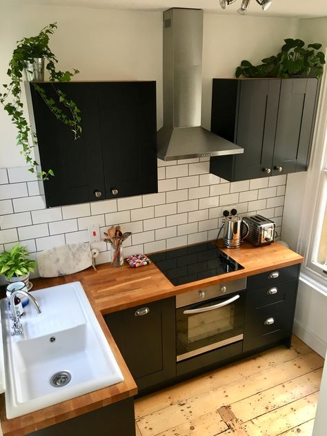 Black Kitchen On A Budget, Tiny Black Kitchen Ideas, Black And Wood Small Kitchen, Tiny Kitchen Black Cabinets, Apartment Kitchen Reno, Kitchen Small Black, Black Tiny Kitchen, Cozy Black Kitchen, No Stove Kitchen Ideas