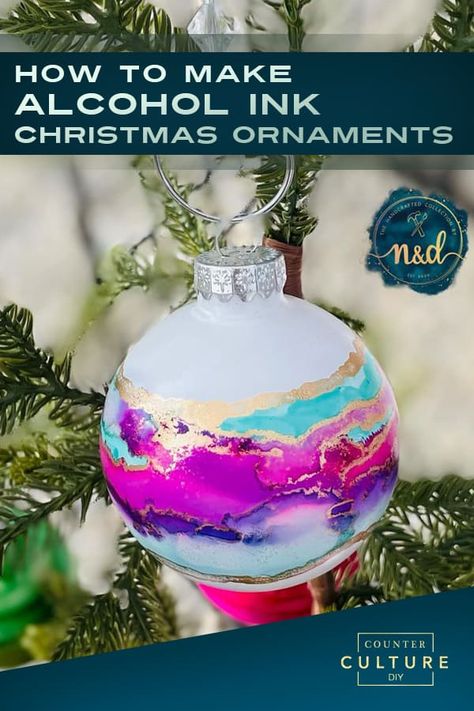 Learn how to make alcohol ink Christmas ornaments. These DIY Christmas ornaments are uniquely beautiful. We give you the video tutorial, supply list, and step by step instructions! Epoxy Resin Christmas Balls, Making Alcohol Ink, Alcohol Ink Christmas Balls, Poured Paint Christmas Ornaments, Alcohol Ink Christmas Ornaments Diy, Acrylic Pour Ornaments Diy, Nail Polish Ornaments Diy, Alcohol Ink Glass Ornaments, Alcohol Ink Baubles