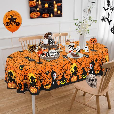 PRICES MAY VARY. 【PREMIUM MATERIAL】Oval Halloween tablecloth is made of high quality ployester which is soft and durable, with exquisite and firm stitching, and not easily loose. Waterproof, washable and wrinkle free. Halloween table cloths oval will protect your table and furniture from scratches, stains and sun damage. 【SUITABLE TABLE SIZE】Halloween oval tablecloth 60x84 inch is fit for 36 x 60 inches to 48 x 72 inches dining table, can seat 6-8 people, better match your table and give you a d Halloween Table Cloth, Decorate Halloween, Halloween Tea Party, Halloween Tablecloth, Dinner Decor, Oval Tablecloth, Dinner Decoration, Party Dinner, Table Cloths