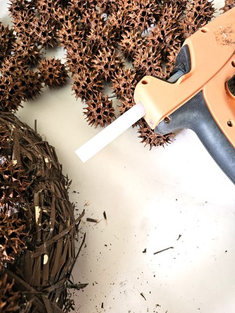 Sweet Gum Ball Wreath Transform Your Decor Today! - Cloches & Lavender Sweet Gum Tree Crafts, Sweet Gum Tree, Quick Baking, Salvaged Furniture, How To Remove Glue, Straw Wreath, Sweet Gum, Ball Wreath, Gum Tree