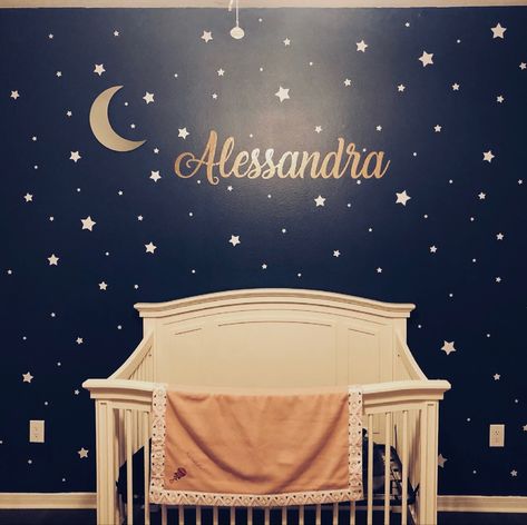 Nursery with moon and stars background with a name decal Night Time Nursery Theme, Starry Night Nursery Theme, Star Nursery Theme, Navy Baby Room, Stars Nursery Theme, Twinkle Twinkle Nursery, Starry Night Nursery, Night Sky Nursery, Twinkle Twinkle Little Star Nursery