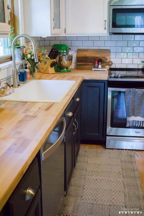 Paint Sink Faucet, Trilevel Home, White Kitchen Cabinets With Butcher Block, Paint Sink, Galley Kitchen Redo, Navy Blue Kitchen Cabinets, White Upper Cabinets, Redo Kitchen Cabinets, Herringbone Kitchen