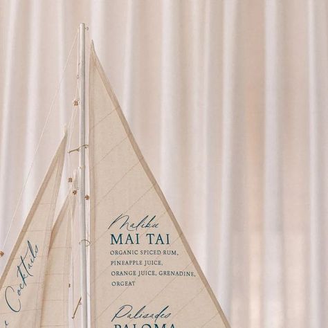 Velvet Fox Designs on Instagram: "We love custom requests like this! The sweetest couple sent their model sail boat to us to print their signature cocktail drinks for their wedding party! What a gorgeous and fun way to celebrate 🥂 . . . Venue/Catering @belairbayclub Wedding Planning + Design @stylishdetails Photography @jennyquicksall Videography @luxurylifestylestudio Floral @carlakayes Rentals @archiverentals @theonicollection Glassware Rentals @mtb_event_rentals Linens @bbjlatavola  Stationery & Signage @velvetfoxdesigns" Boat Wedding Decor, Coastal Chic Wedding, Signature Cocktail Drinks, Chic Garden, Boat Wedding, Mai Tai, Coastal Wedding, Fox Design, Sail Boat