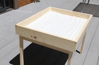 Hacked Ikea table with chairs $20!!   Pencilick: Sand Table - DIY Sand Boxes, Sand Tray Therapy, Diy Kids Playground, Sand Tray, Ikea Table, Rustic Woodworking, Woodworking Storage, Woodworking Bed, Backyard Diy