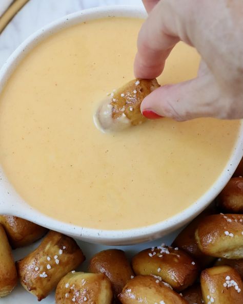 It only takes 10 minutes to make this delicious, creamy Beer Cheese Dip for a quick and easy appetizer or snack! It's a tasty addition to an Oktoberfest charcuterie board, the perfect dip for warm pretzels, or use it as a sauce to make Irish Nachos. This beer cheese recipe is so easy to make and incredibly flavorful! Oktoberfest Charcuterie Board, Beer Cheese Pretzel Dip, Oktoberfest Charcuterie, German Beer Cheese Dip For Pretzels, Beer Cheese Dip For Pretzels, Guiness Beer Cheese Dip For Pretzels, Octoberfest Beer Cheese Dip, Pretzel Beer Cheese Dip, Irish Appetizers