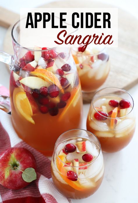 Fall Spiced Apple Cider Sangria, Apple Cider Caramel Vodka White Wine, Apple Cider Sangria Recipe With Vodka, White Wine Sangria Recipe Fall, Sangria For Thanksgiving, Thanksgiving Apple Cocktails, Apple Cider Wine Slushies, Fall Cider Cocktails, Apple Cider Sangria With Caramel Vodka