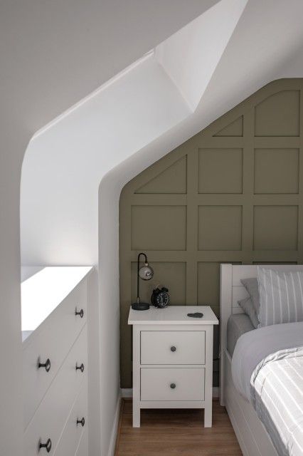 Eaves Bedroom Panelling, Panelling Loft Bedroom, Panelling Attic Room, Panelling On Slanted Wall, Farrow And Ball Treron Bedroom, Loft Bedroom Wall Panelling, Wall Paneling Slanted Ceiling, Treron Farrow And Ball Bedroom, Bedroom With Eaves