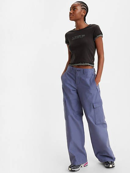 A little grungy, a little '90s and a whole lotta style. With a flattering mid rise and a loose, relaxed fit, our Baggy Cargo pants are inspired by beloved vintage cargos with just the right amount of bagginess for everyday wear. The best part? Their oversized pockets are perfect for stashing your keys, phone;you name it. A little grungy, a little '90s A flattering mid rise Cut with a relaxed, baggy fit Features a wide, straight leg Finished with oversized patch pockets Blue Cargo Pants Outfit, Cargo Pants Outfit Women, Baggy Shirt, Blue Cargo Pants, Women Cargo Pants, Baggy Cargo Pants, Cargo Pants Outfit, Baggy Style, Straight Cut Jeans