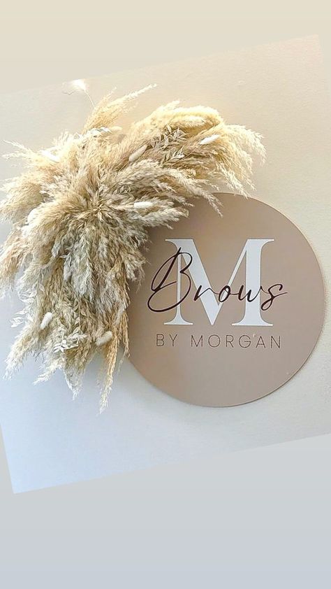 Stunning pampas, dried flower wall decor suitable for your salon logo or mirror, your home or for your wedding! This consists of fluffy pampas, dried, preserved and artificial flowers in neutral, colours. Please look at my other listings if you would like to add more colour and florals. It is really easy to install. 2x strong adhesive hooks will be supplied with it which you stick to the wall and hook onto the back of the piece. Size mini = 50cm wide Size medium = 70cm wide  Size large = 90cm wide  The piece in the main picture is size medium. Please message me if you're requiring it urgently and I will see what I can do 😊  Everything I make is handmade and therefore no two pieces are the same. The colours will match what you have ordered but different flowers maybe used depending on what Boho Salon Decor Ideas, Beige Salon Decor, Salon Flower Decor, Flowers Around Mirror, Salon Selfie Wall, Flower Wall Salon, Home Salon Decor, Dried Flower Wall Decor, Pampas Wall Decor