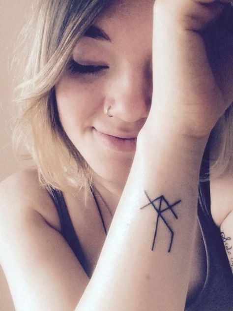 20 Rune Tattoos For Women Using The Viking Elder Futhark That Have Deep Meanings | YourTango Rune Tattoos For Women, Viking Tattoo Meaning, Icelandic Tattoo, Rune Tattoos, Norwegian Tattoo, Viking Rune Meanings, Simbols Tattoo, Viking Symbols And Meanings, Traditional Viking Tattoos