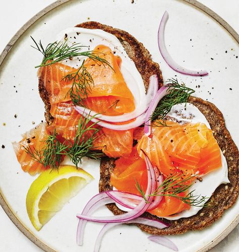 Try These Salmon-Topped Pancakes This Weekend Salmon Pancakes, Breakfast Salmon, Roasted Sunflower Seeds, Savory Salmon, Savory Pancakes, Buckwheat Flour, Cashew Milk, Lemon Wedge, Breakfast Of Champions