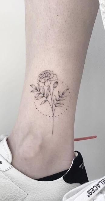 << Check out more Marigold Tattoos, Ideas and Meanings #tattoomenow #tattooideas #tattoodesigns #tattoos #Marigold #flower #floral #birthflower Marigold And Iris Tattoo, Daisy And Marigold Tattoo Small, Birth Flower Tattoos Marigold, October Floral Tattoo, Marigold Fineline Tattoo, Cosmo Marigold Flower Tattoo, Marigold Tattoo Black And Grey, Mari Gold Flower Tattoo, Fineline Marigold Tattoo