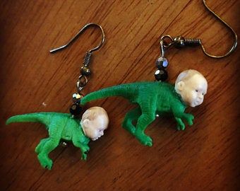 Goofy Earrings, Dino Cake Topper, Silly Earrings, Aesthetic University, Interesting Earrings, Dino Cake, Weird Jewelry, Pride Jewellery, Baby Dino