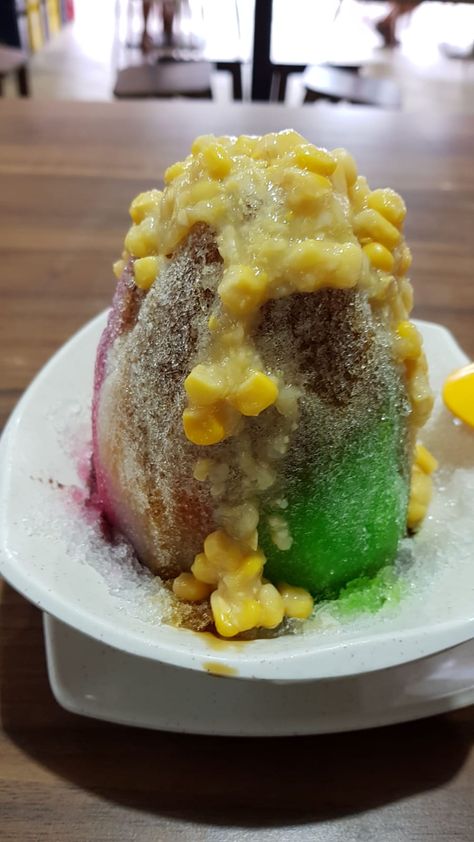 [I ate] Ice Kachang - an ice dessert with jelly and red beans underneath soaked in sweet syrup and corn. Ice Kachang, Ice Kacang, Corn Food, Ice Dessert, New Menu, Food Images, Red Beans, The Hub, Street Food