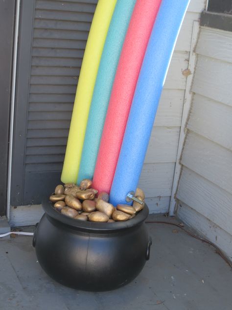 this rainbow and pot of gold easy to make! pool noodles with a long blot and nut to hold it together, paint rocks gold, fill pot with paper or Styrofoam add a cardboard top to place gold rocks on and done! Rainbow And Pot Of Gold, Fancy Candle Holders, Sant Patrick, St Patricks Decorations, Pool Noodle Crafts, St Patricks Day Decor, St Patricks Crafts, San Patrick, Paint Rocks