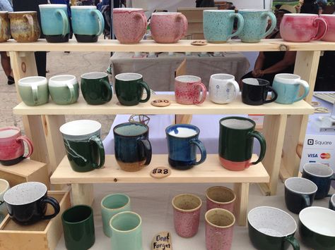 Mugs displayed on newly constructed shelves.  The rain didn't dampen our spirits! Cup Display For Craft Show, Mug Stand Display, How To Display Mugs At A Craft Fair, Craft Fair Mug Display, Mug Display Ideas Craft Show, Pottery Booth Display, Convention Display, Booth Display Ideas, Market Stall Display