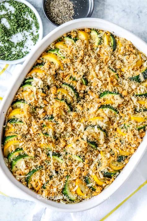 This easy yellow squash casserole is the perfect way to use the abundance of summer squash available! Made with yellow squash, zucchini, onions, and a buttery cheesy breadcrumb topping, this casserole is baked until browned and crisp. #spendwithpennies #squashcasserole #summersquash #zucchinicasserole #zucchinirecipe #squashrecipe Zuchini And Squash Recipes, Easy Yellow Squash Recipes, Baked Yellow Squash, Easy Squash Casserole, Zucchini Squash Casserole, Healthy Squash Recipes, Summer Squash Casserole, Breadcrumb Topping, Yellow Squash Casserole