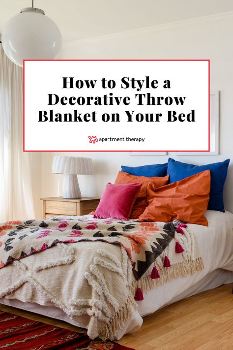 Although we love decorative blankets from places like Anthropologie and Urban Outfitters, their throws don’t fully cover a queen or even a full-sized bed. Until companies start making bigger decorative blankets, one of these methods on how to style a throw blanket on your bed should come in handy. Throw Blanket On Twin Bed, Large Throw Blanket On Bed, Bed Throws Styling, Accent Blanket On Bed, Two Throw Blankets On Bed, Style Throw Blanket On Bed, Decorative Blanket On Bed, Throws For Beds, King Size Throw Blanket