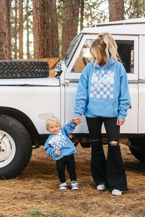 MAMA checkered hoodie in light blue. This trendy MAMA hoodie is super comfortable & pairs perfectly with the kids MINI hoodie for cool matching family outfits! Shop the full Krista Horton x Slyfox collection for more trendy mom sweatshirts, matching family sweatshirts & everything you need to achieve the ultimate cool mom aesthetic.