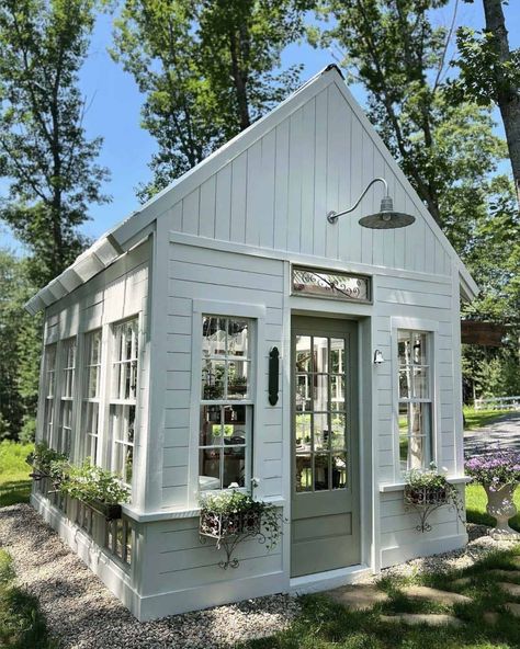 22 Ultimate Greenhouse Garden Shed Ideas You'll Love Gardens With Sheds, Rustic Green House Ideas, Garden Shed With Greenhouse Attached, L Shaped Greenhouse, Greenhouse With Shed, Houses With Greenhouses Attached, Greenhouse Designs Ideas, White Greenhouse Ideas, Contemporary Shed Ideas