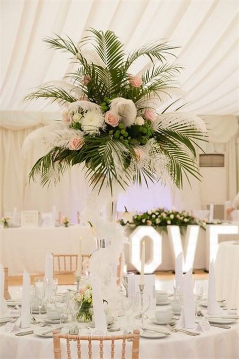 palm leaf tall wedding centerpiece / http://www.himisspuff.com/green-tropical-leaves-wedding-ideas/2/ Palm Leaf Centerpiece, Greenery Wedding Centerpieces, Tall Wedding Centerpieces, Tall Centerpieces, Wedding Leaves, Classy Wedding, Wedding Table Centerpieces, Tropical Wedding, Wedding Deco