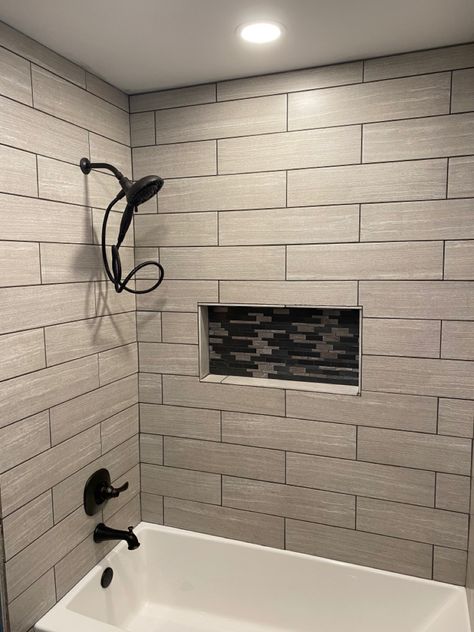 Shower Tile Ideas Oil Rubbed Bronze, Dark Tile Tub Surround, Tile And Tub Ideas, Shower Tile Ideas Dark Grout, Bathroom Tile With Dark Grout, Charcoal Grout Bathroom, Bath Tub Tile Ideas Shower Surround, Tile Over Bathtub, Tubs With Tile Surround