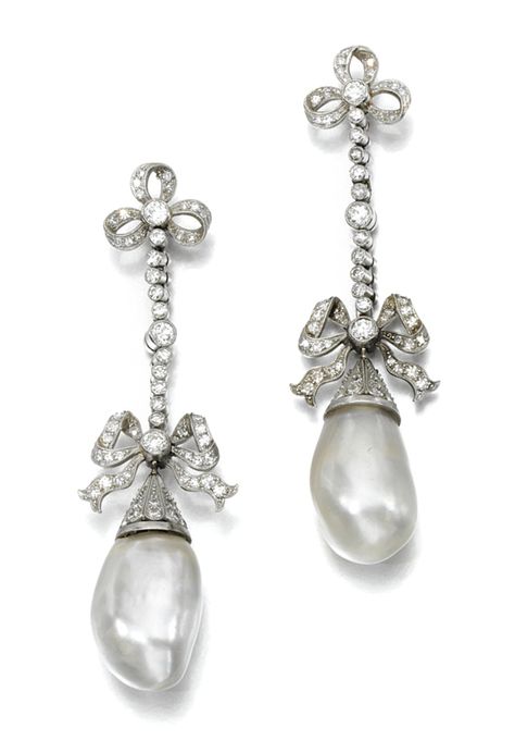 Pair of pearl and diamond earrings, early 20th century. Each designed as a line of millegrain collet-set circular-cut diamonds between trefoil and bow motifs, suspending a pearl drop Natural Pearl Earrings, Edwardian Jewelry, Pearl And Diamond Earrings, White Gold Earrings, Fine Jewels, Rose Cut Diamond, Antique Jewellery, Natural Pearls, Bling Bling