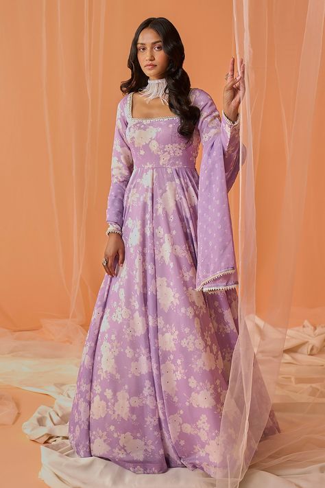 Lilac anarkali with floral prints and stone work embroidery. Paired with chanderi bottom and dupatta. Components: 3 Pattern: Printed, Embroidered Type Of Work: Floral Neckline: Square Sleeve Type: Full Fabric: Chanderi, Lining: Chanderi Color: Purple Other Details:  Back tassel tie-up Bead border detailing Back deep neck Printed, embroidered dupatta Occasion: Wedding - Aza Fashions Square Neck Anarkali, Satin Anarkali, Bandhani Lehenga, Floral Print Anarkali, Velvet Anarkali, Indian Anarkali, Designer Anarkali Dresses, Designer Anarkali Suits, Simple Frocks