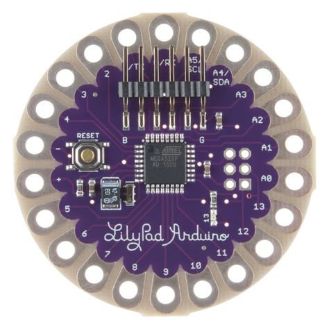 Choosing a LilyPad Arduino for Your Project Lilypad Arduino, Arduino Usb, Conductive Thread, E Textiles, Arduino Board, Clothing Crafts, Output Device, Power Board, 8 Bits