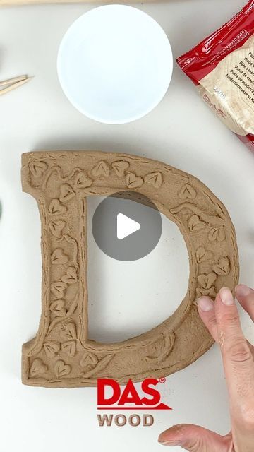 DAS clay on Instagram: "Promises must be kept, so here is the video tutorial to create the “D” letter with #DASWood, our wood air-hardening modelling clay, based on natural ingredients, as tender wood fibres and water.

As in this case, the creations modelled with Das Wood can be inlaid during the slow drying phase with #DASAccessories, such as spatulas, wire knifes and wooden sticks.
Then, once completely dried, you will able to have fun to paint and customize them with watercolour inks, like those Aquafine by @dalerrowney1783!

And you, which letter will you make? We wait for you in the comments! 👇🏻

Le promesse vanno mantenute e allora ecco il video tutorial per creare la lettera “D” con #DASWood, la nostra pasta legno per modellare auto-indurente all’aria e a base di ingredienti natu Das Clay, Modelling Clay, Modeling Clay, Wood Fiber, Watercolor And Ink, Video Tutorial, Have Fun, Natural Ingredients, Paint