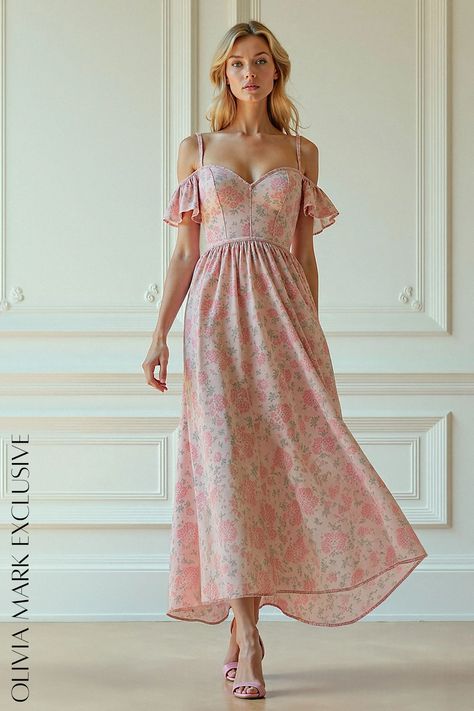 Crafted with a delicate floral pattern that whispers of springtime gardens, its soft pink fabric drapes gracefully over the figure. The sweetheart neckline and ruffled off-the-shoulder sleeves add a touch of romantic allure, while the cinched waist and flowing skirt create a silhouette that is both timeless and modern. This dress is not just an article of clothing; it's a celebration of the beauty within each of us. Blush Pink Floral Bridesmaid Dresses, Pink Floral Bridesmaid Dresses, Uzun Boy, Floral Bridesmaid Dresses, Floral Bridesmaid, Pink Floral Print, Flowing Skirt, Floral Print Maxi, Draped Fabric