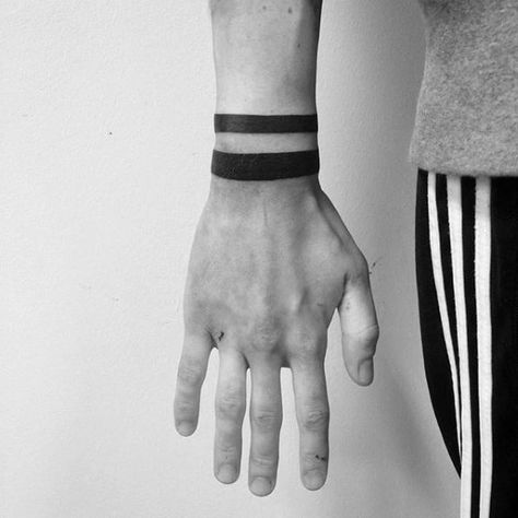 Top 43 Black Band Tattoo Ideas [2021 Inspiration Guide] Arm Tattoos With Meaning, Black Band Tattoo, Wrist Band Tattoo, Band Tattoos For Men, Small Wave Tattoo, Black Line Tattoo, Tatuagem Masculina Pequena, Cool Wrist Tattoos, Band Tattoo Designs