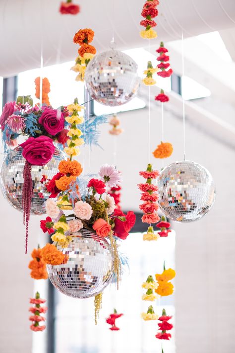 Colorful And Eclectic Wedding Flowers In Rhode Island Disco Ball And Flower Wedding, Flowers And Disco Ball Party, Floral Party Decorations Indoor, Hanging Flowers And Disco Balls, Disco Floral Aesthetic, Garden Party Disco Ball, Disco Balls And Florals, Colorful Disco Ball Wedding, Floral Disco Ball Wedding