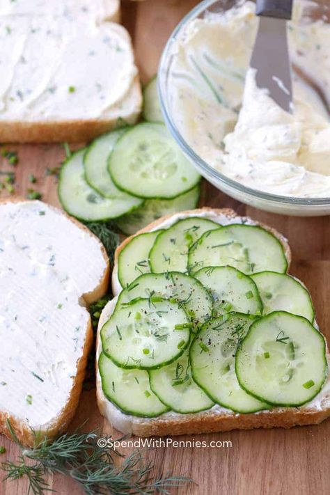 Cucumber Sandwiches are spread with a fresh herbed cream cheese and stacked high with thinly sliced cucumbers. #spendwithpennies #cucumbers #cucumbersandwiches #creamcheese #easyrecipe #brunchrecipe #tearecipes Cucumber Ideas, Herbed Cream Cheese, Cucumber Sandwiches Recipes, Cucumber Sandwich, Cream Cheese Sandwiches, Cucumber Tea Sandwiches, Tea Party Sandwiches, Tea Sandwiches Recipes, Cream Cheese Spread