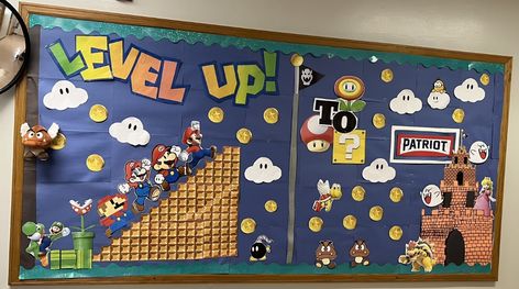 Super Mario Bulletin Board made of paper and printouts Mario Brothers Bulletin Board Ideas, Space Invaders Bulletin Board, Super Mario Classroom Decorations, Super Mario Bros Bulletin Board, Level Up Bulletin Board, Super Mario School Theme, Super Mario Bulletin Board Ideas, Mario Bros Bulletin Board, Mario Brothers Bulletin Board