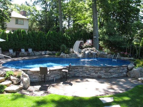 Steep Terrain: Creating a Backyard Escape that “Wows!” Pool With Ledge, Above Ground Pool Decor, Pool Decor Ideas, Semi Above Ground Pool, Ideas For Small Yards, Pools Backyard Inground, Sloped Yard, Sloped Backyard, Above Ground Pool Landscaping