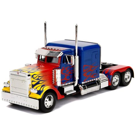 Zavvi - The Home of Pop Culture Fans of Transformers will love this T1 Optimus Prime die-cast toy vehicle. Optimus Prime is a fan favourite and is 1:24 scale or approx. 20 cm. This vehicle has opening doors, truck and hood, plus freewheeling. Exact replica T1 Optimus Prime. Optimus Prime Truck, Optimus Prime Transformers, Transformers Cars, Marvel Infinity, Transformers Bumblebee, Transformers Optimus, Transformers Optimus Prime, Transformers Characters, Opening Doors