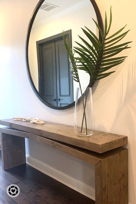 Organic modern entry Wood console Reclaimed wood Oversized plant stems White marble chain link decor Oversized round mirror 60” round mirror Large console table #competition #organicmodern Follow my shop @hausofsavos on the @shop.LTK app to shop this post and get my exclusive app-only content! #liketkit #LTKhome #LTKstyletip #LTKsalealert @shop.ltk https://liketk.it/3O3cc Console Table Black Wall, Console Table Decorating Large Wall, Black Round Mirror Over Console Table, Organic Modern Console Table Decor, Console Table Round Mirror, Round Mirror Console Table, Round Entry Mirror, Black Round Mirror Entryway, Organic Modern Console Table