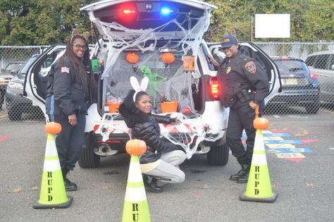 "Trunk-or-Treat" Rutgers University Police Department--Newark hosted "trunk-or-treat" at the CCLC Daycare Center (KinderCare Education at Work). Police Trunk Or Treat, Trunk Or Treat Police Theme, Daycare Center, Police Department, Trunk Or Treat, Community Events, Law Enforcement, Fall Festival, Police Cars