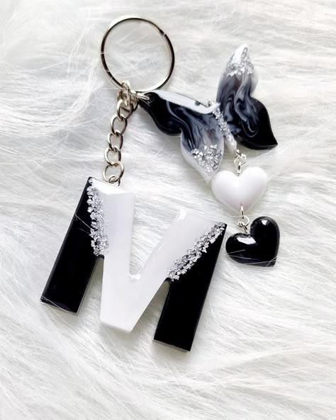 Black and White Butterfly Keychain, on the way to the customer ❤️ Check my Etsy Shop for more details or link in Bio for Insta. #resinjewelry #resinart #resinartist #resincrafter #epoxyresin #epoxyresinart #epoxyjewelery #handmadewithlove #handmadegifts #handcrafted #smallbusinessowner #supportsmallbusine Resin Book Cover, Bio For Insta, Diy Resin Phone Case, Resin Letter Keychain, Diy Resin Keychain, Jewelry Box Plans, Black And White Butterfly, Resin Butterfly, Butterfly Keychain