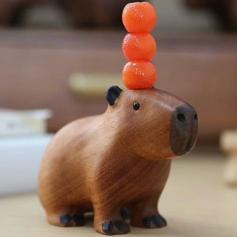 A wooden-carved capybara, its head can hold anything.🤣 #wood #woodcarving #wooddesign #capybara #viral Carving Art, Wood Carving Art, Whittling, Wood Design, Wood Carving, Woodworking, Carving, Canning, Wood