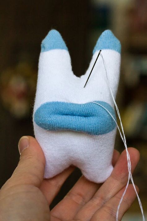 A few months ago superdad Joel introduced me to the world of sock monsters and I've been hooked ever since. I wrote about it briefly here. ... Sock Monsters, Diy Sock Toys, Sock Monster, Sock Snowman, Cardboard Toys, Sock Puppets, Softie Pattern, Sock Doll, Sock Dolls