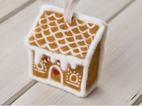 This gingerbread house has been lovingly hand made using merino wool, flat felted into panels and then felted together using a core wool base. It is made from a ginger coloured wool, and has been finished with a wool covered wire frame for realism and durability and finished with lovely details, such as icing dripping from roof, red and white candy canes and roof/door/window details. Needle Felt Gingerbread House, Felted Gingerbread House, Needle Felt House, Needle Felted Gingerbread House, Real Gingerbread House, Felt Gingerbread House, Felt House, Needle Felting Diy, Needle Felted Christmas