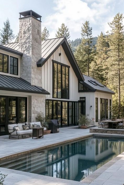 Cashmere&Pearls Lifestyle White Chalet House Exterior, Types Of Modern Houses, Modern Farmhouse Chimney Exterior, White Black Barndominium, Master Bath Mountain Home, Cream House Exterior Black Trim, Modern Roof Lines Design, Black White Wood Exterior, Barndominium White Exterior