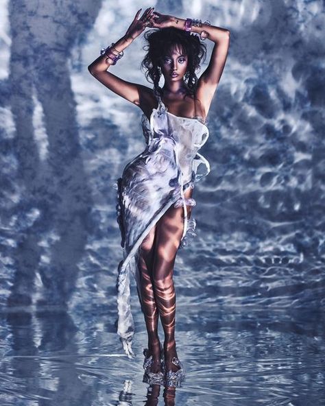 Tiana Parker on Instagram: "🪐🪐 shot by @jdthecombo styled by @aldotg hair @lurissaingridhair makeup @saintlaurahs" Water Aesthetic Photography, Water Bearer Photoshoot, Water Floor Photoshoot, Water Sign Photoshoot, Water Photoshoot Black Women, Aquarius Photoshoot Inspiration, Water Goddess Aesthetic, Aquarius Photoshoot, Ethereal Poses