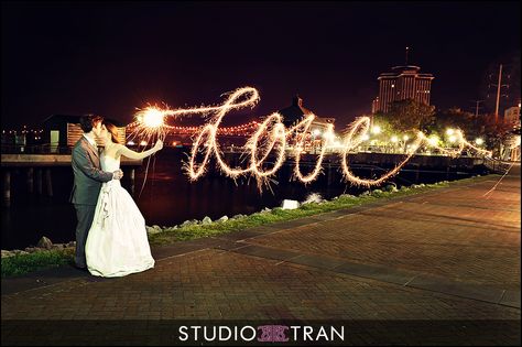 Everyone loves a photo with wedding sparkler writing.  A beautiful photo by studio tran. Wedding Inexpensive, Wedding Sparklers Photos, Marine Wedding, New Years Eve Weddings, The Word Love, Wedding Money, Wedding Sparklers, Pink Bride, Inexpensive Wedding