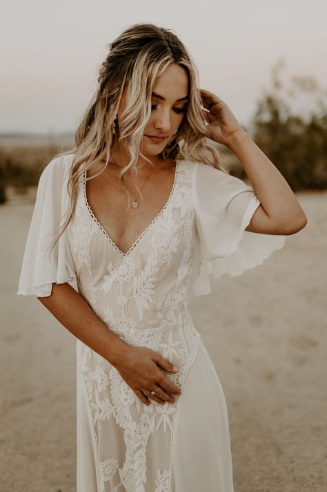 joshua-tree-airbnb-joshua-tree-elopement-joshua-tree-wedding-desert-elopement-california-desert-wedding-joshua-tree-national-park-southern-california-wedding-photographer-terracotta-color-scheme-vintage-glass-cups-maroon-napkins-dreamers-lovers-dress-wedding-hairstyles-wedding-makeup-roaming-travelers-venue-friar-tux-suit Desert Boho Wedding Dress, Desert Wedding Makeup, Dessert Elopement Dress, Simple Western Wedding Dresses, Casual Western Wedding Dress, Boho Farm Wedding Dress, Boho Wedding Dress With Short Sleeves, Western Elopement Wedding Dresses, Desert Elopement Dress