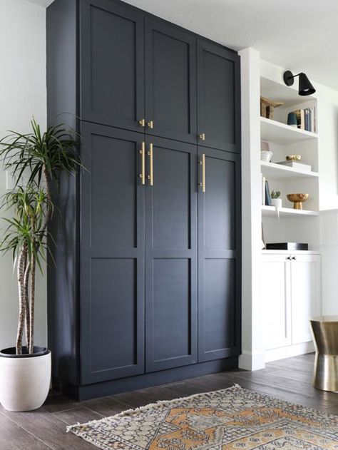 with our kids growing and starting to clean out the pantry at what seems an hourly rate, we knew we had to figure out a better option. We came up with a solution to convert our current laundry room off the kitchen into a walk-in pantry... Dark Blue Cabinets, Built In Pantry, Diy Kitchen Storage, Blue Cabinets, غرفة ملابس, Kitchen Storage Solutions, Floor Ideas, Laundry Room Storage, Ikea Pax