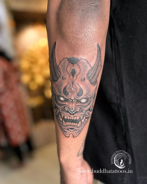 Oni mask tattoo symbolizes protection, power, and the balance between good and evil. In Japanese folklore, Oni are demons or ogres that can be both malevolent and protective, depending on the context. The tattoo often represents the wearer’s struggle with their darker impulses or a reminder of the consequences of evil deeds. It can also signify strength in overcoming adversity. : : : : : : : : : : : : : #artist #artistatwork #artistsofinstagram #bodyart #besttattoos #buddhatattoostudiohydera... Asura Demon Tattoo, Evil Samurai Tattoo, Asian Demon Tattoo, Buddha And Demon Tattoo, Japan Demon Tattoo, Dynamic Tattoo Ink, Oni Mask Tattoo, Buddha Tattoo, Oni Mask