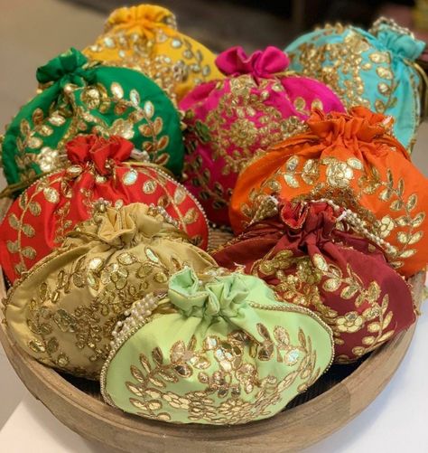 Wholesale Lot Of 100 Indian Handmade Women's Embroidered Potli Purse Bag Pouch Drawstring Bag Wedding Favor Return Gift For Guests Free Ship ------------------------------------------------------------------------------------------------------------------------------------------------------------------------------------------- Pack of - Assorted Colors Potlis * Go ethnic in style with the most spectacular ethnic Rajasthani Gota Patti Potli bag * This Stunning Potli Bag is made from Raw Silk with Potli Purse, Fruit Pouches, Gift For Guests, Potli Bag, Embroidered Clutch, Return Gift, Potli Bags, Cute Purses, Pink Gifts